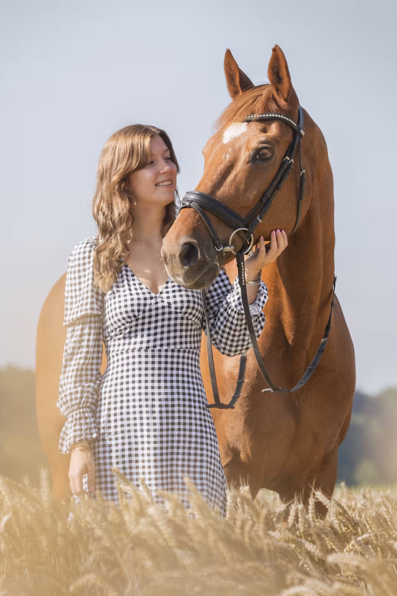 Foto van een vrouw met haar paard